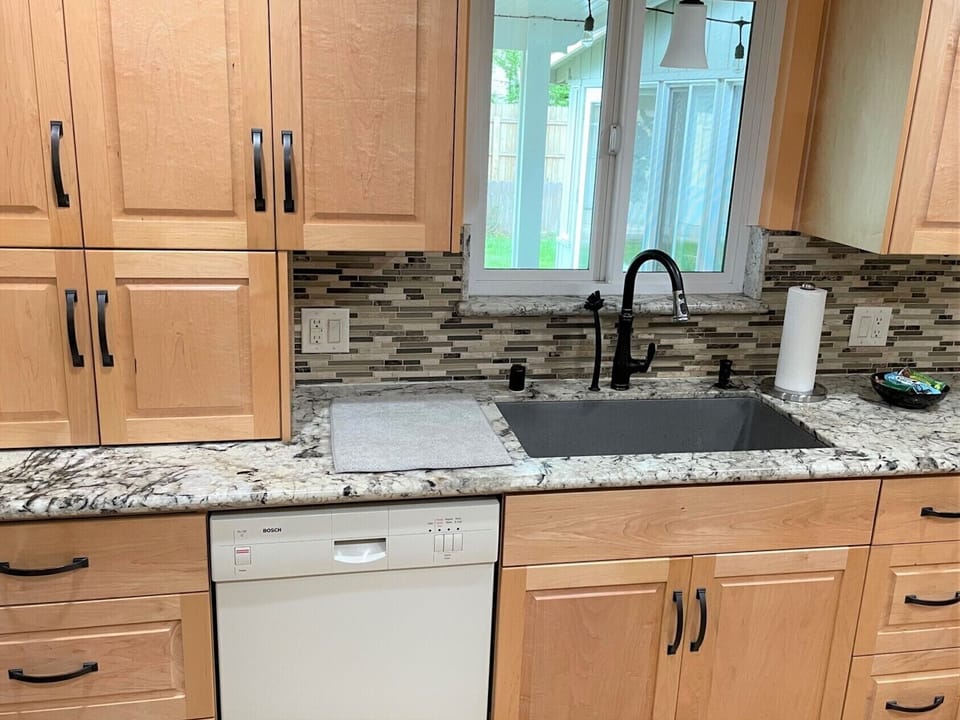 Fully stocked kitchen to cook & enjoy a meal. Dishwasher, fridge, stove, & more.