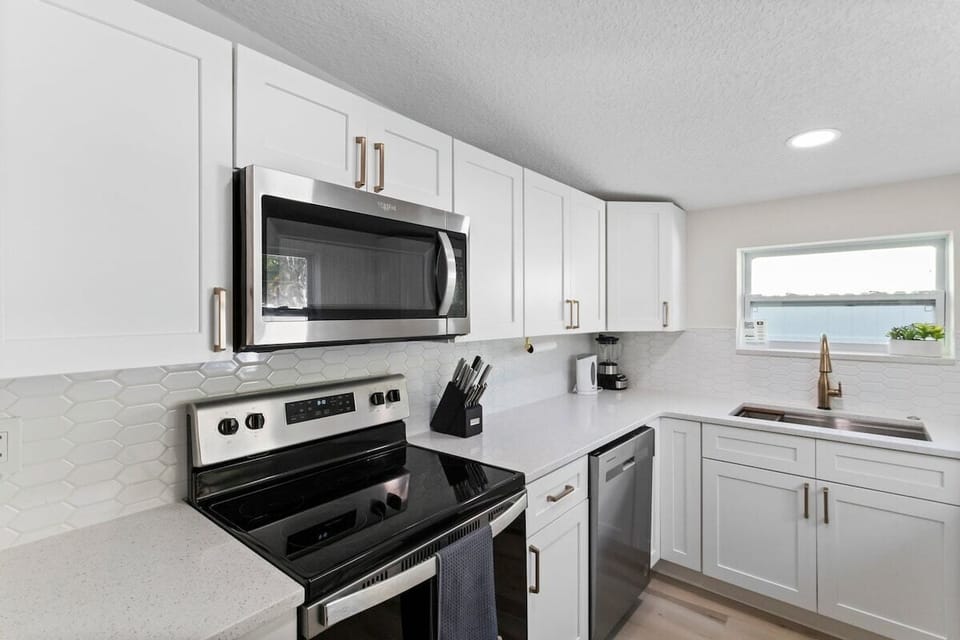 Salt, pepper, cooking oil, starter pack of dishwasher pods provided.  Blender and electric hot water kettle.