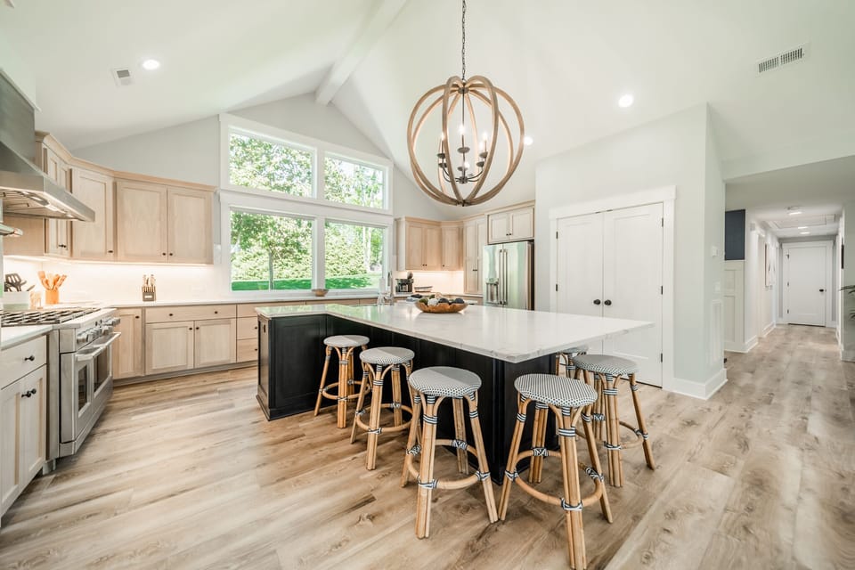 Modern, fully stocked kitchen with island seating for 6.