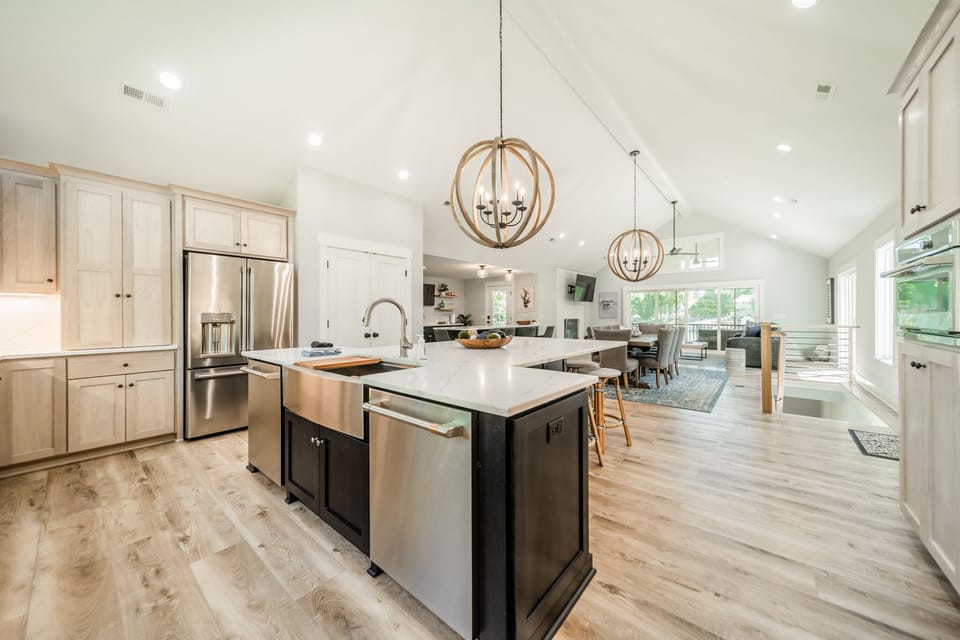 Open concept kitchen, living & dining rooms.