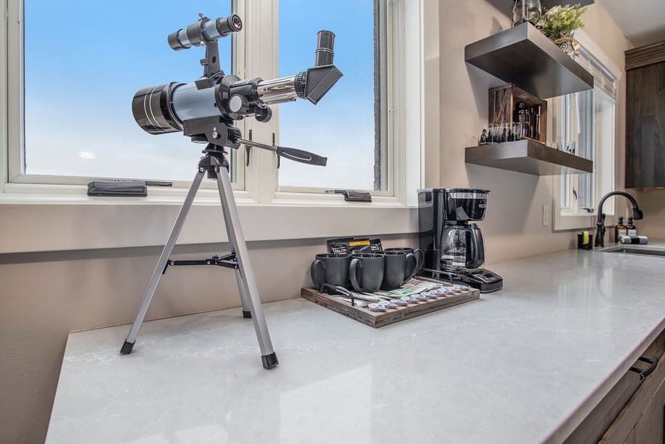 Indulge in complimentary coffee & creamer, while enjoying picturesque views or stargazing through the telescope