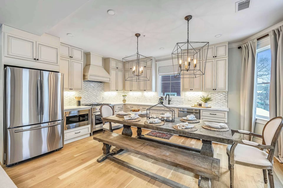 Kitchen | Fully Stocked Kitchen with Stainless Steel Refrigerator | Unit on One Level