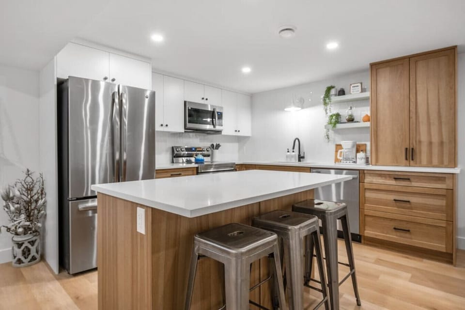 Full kitchen with a drip coffee machine, ground coffee, tea, sugar and basic condiments (ketchup, mustard and relish.)