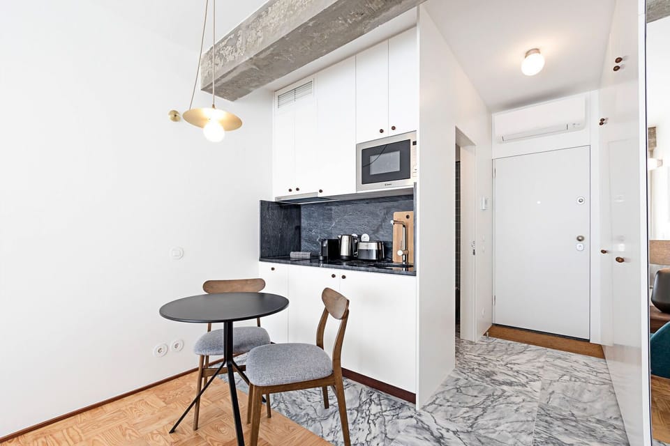 Practical kitchenette equipped with all the appliances required for your basic needs, during your stay #modern #charming