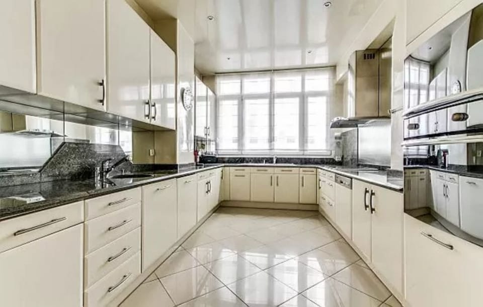 modern fully-equipped kitchen in a 4-bedroom Paris luxury apartment
