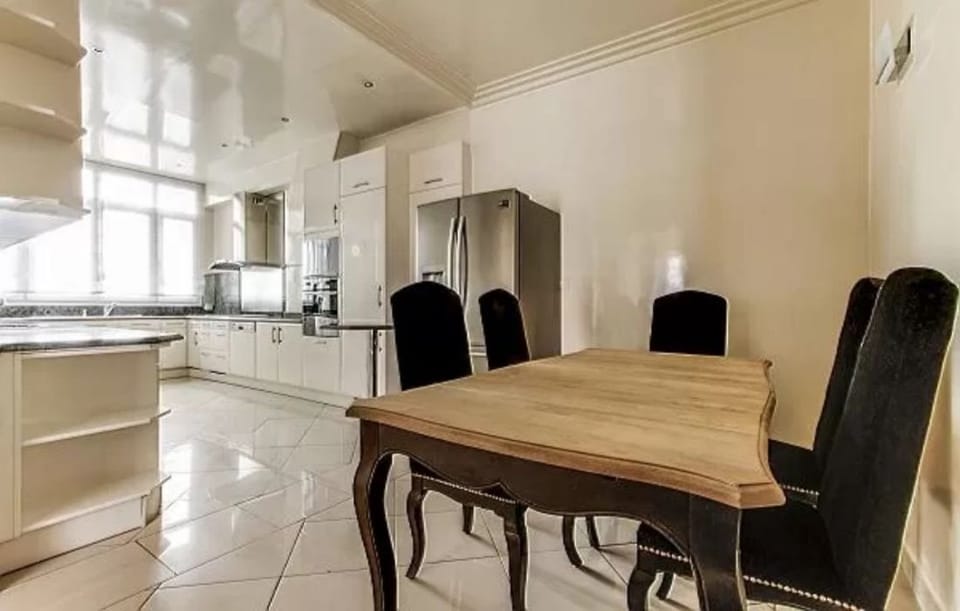 another table for food preparation in a 4-bedroom Paris luxury apartment