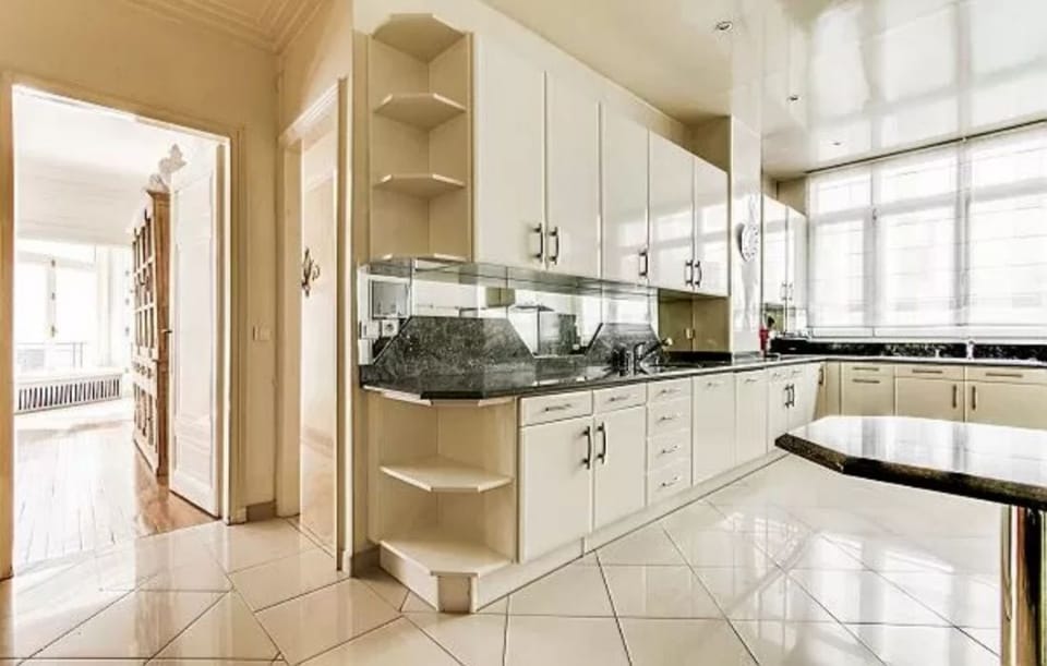 modern fully-equipped kitchen in a 4-bedroom Paris luxury apartment