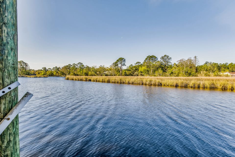 Serene waterfront living at Herron's Villa - perfect for boating enthusiasts!