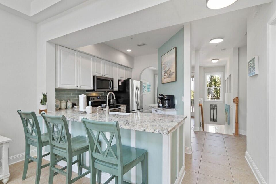 Kitchen area with bar seating