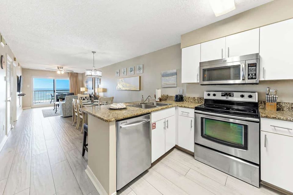 Cook a meal to the backdrop of Gulf views to enjoy out on the balcony or the open layout dining area.