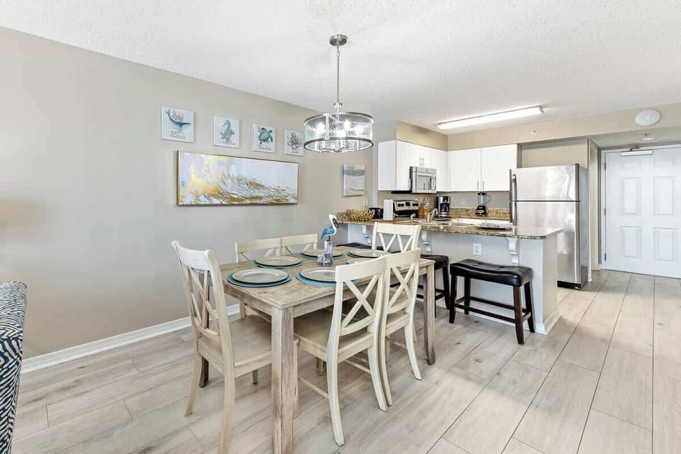 Enjoy meals together in the dining area after a day at the beach.