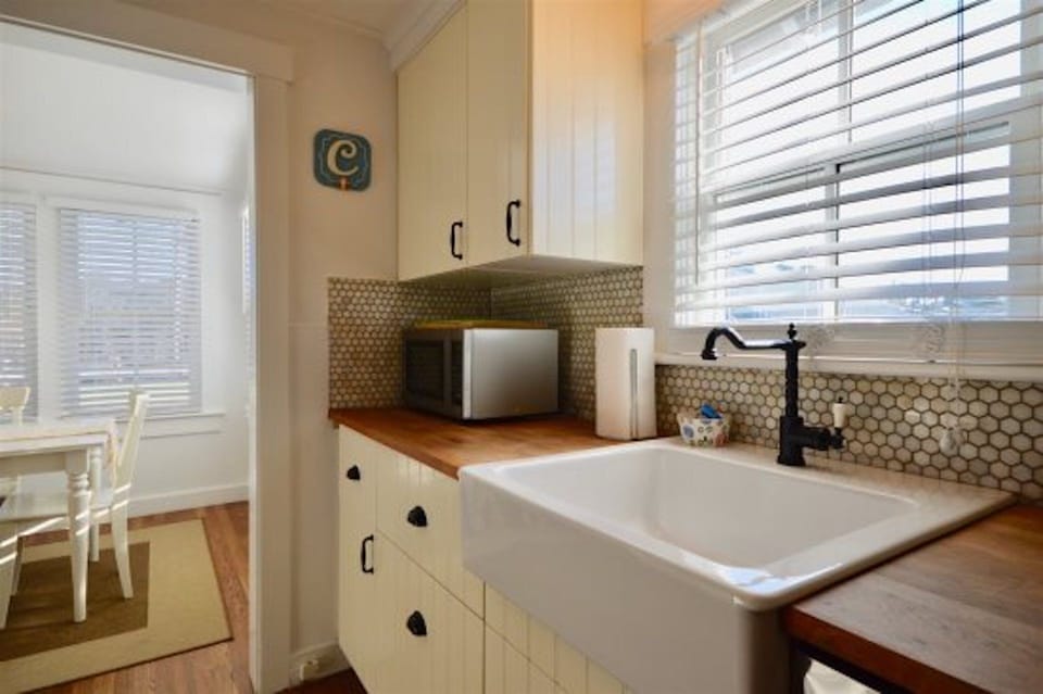 Beautifully restored kitchen with butcher block counters 