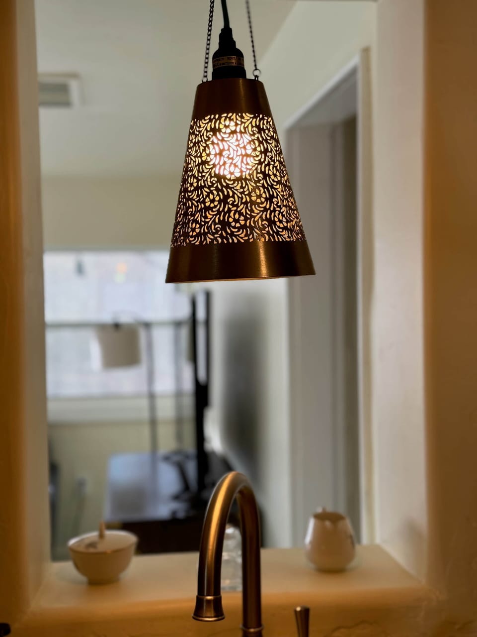 A pass-through between the kitchen and the sun room is a convenient touch.