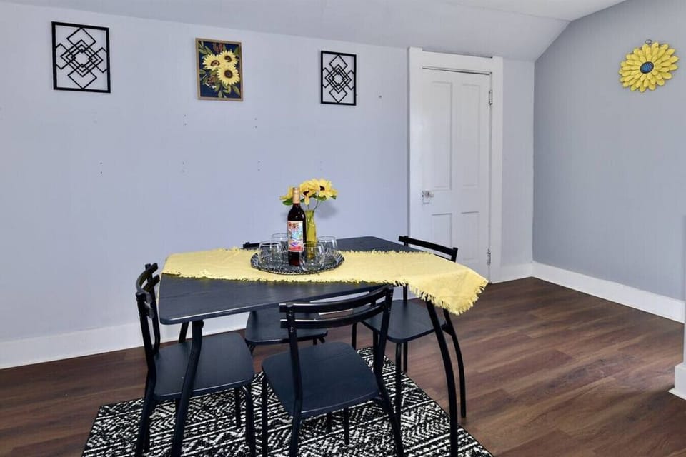 Dining space is set up to seat 4
