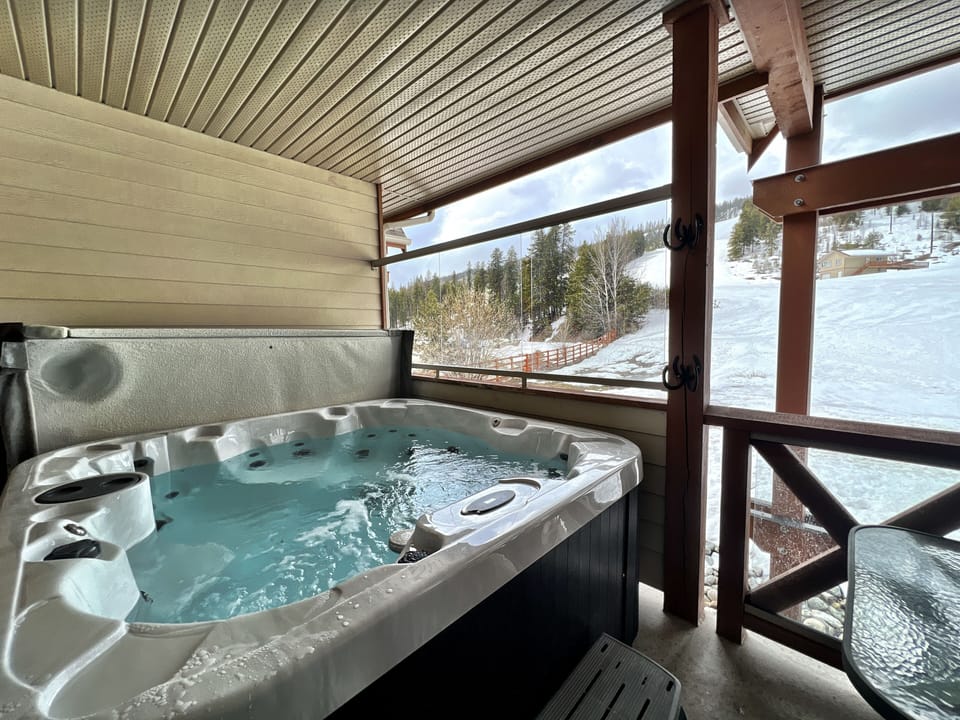 Imagine yourself soaking in this private hot tub on the upper level, overlooking the Main run at Kimberley Alpine Resort.  Location, location, location...