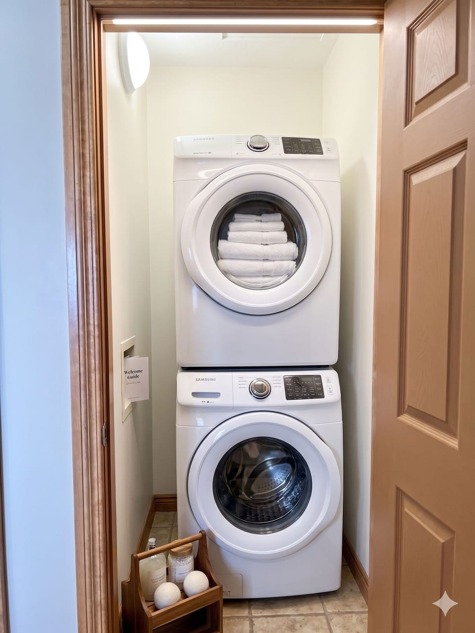 The 2nd Full Bathroom on the upper level along with large front-end laundry facilities.  Laundry detergent is provided for your convenience.  