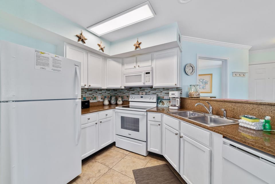 The well-appointed kitchen has everything you need to prepare delicious meals during your stay.