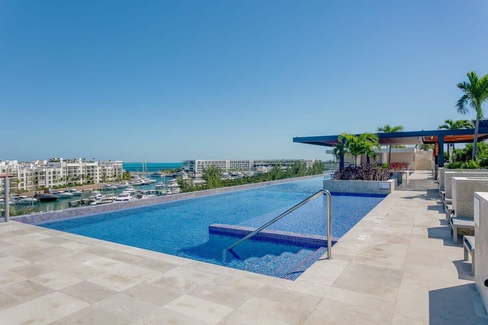 Take in panoramic ocean views while enjoying a refreshing swim in the rooftop infinity pool.