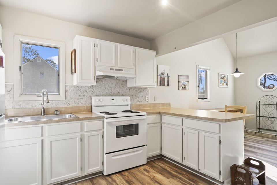 Charming Shabby Chic Kitchen is well-stocked with all you need.