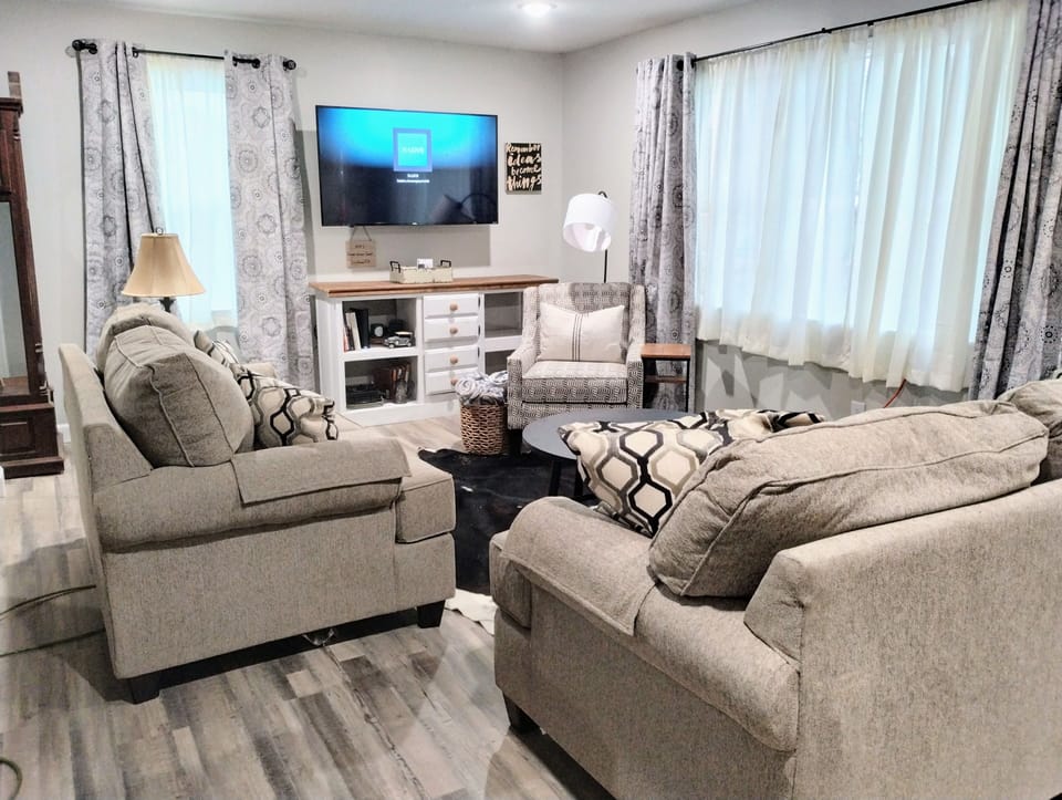 Living room - comfy seating for 6, 60" Roku Smart TV. Wifi throughout the home.