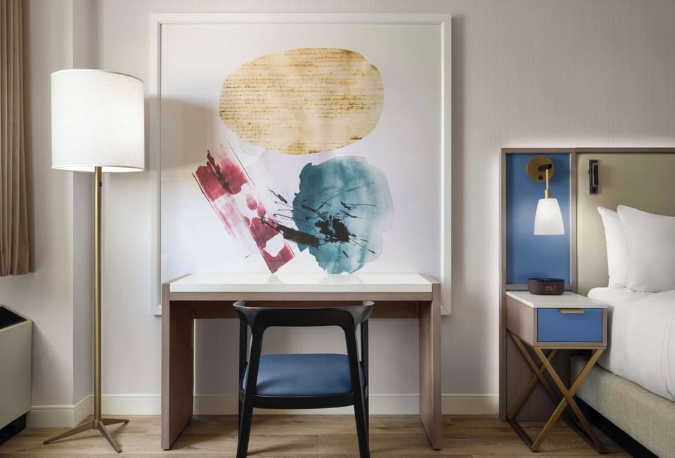 Catch up on emails at a stylish desk and soft lighting