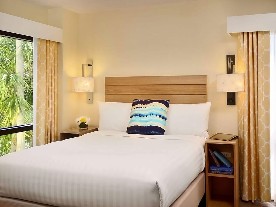 Wake up refreshed with sunshine and calming tropical window views.
