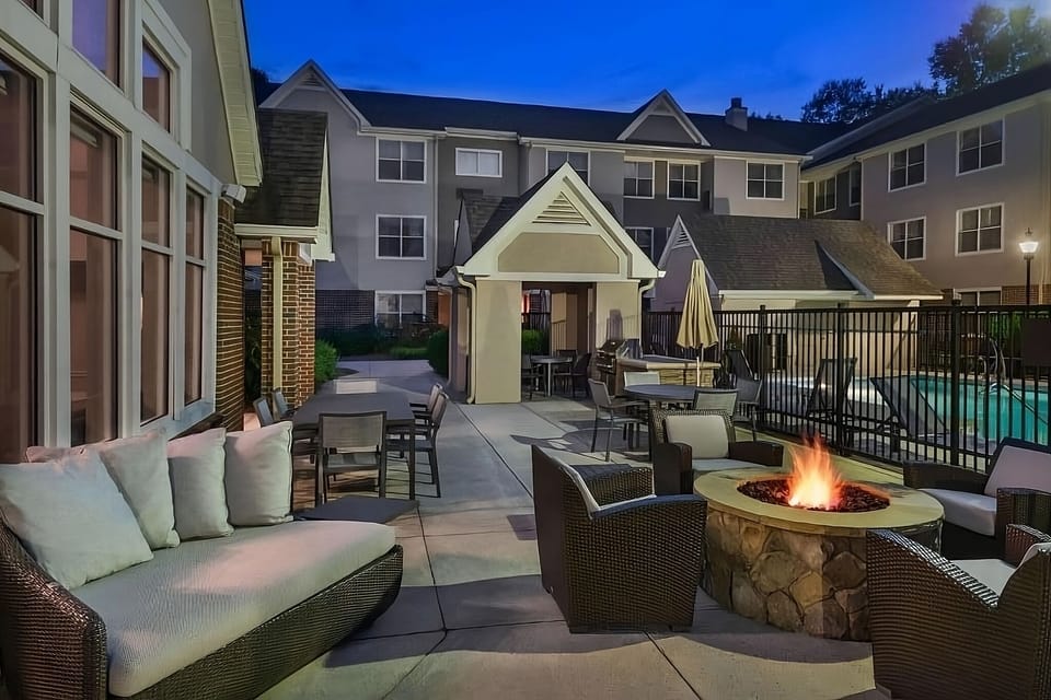 Gather around the glowing firepit for cozy evening chats.
