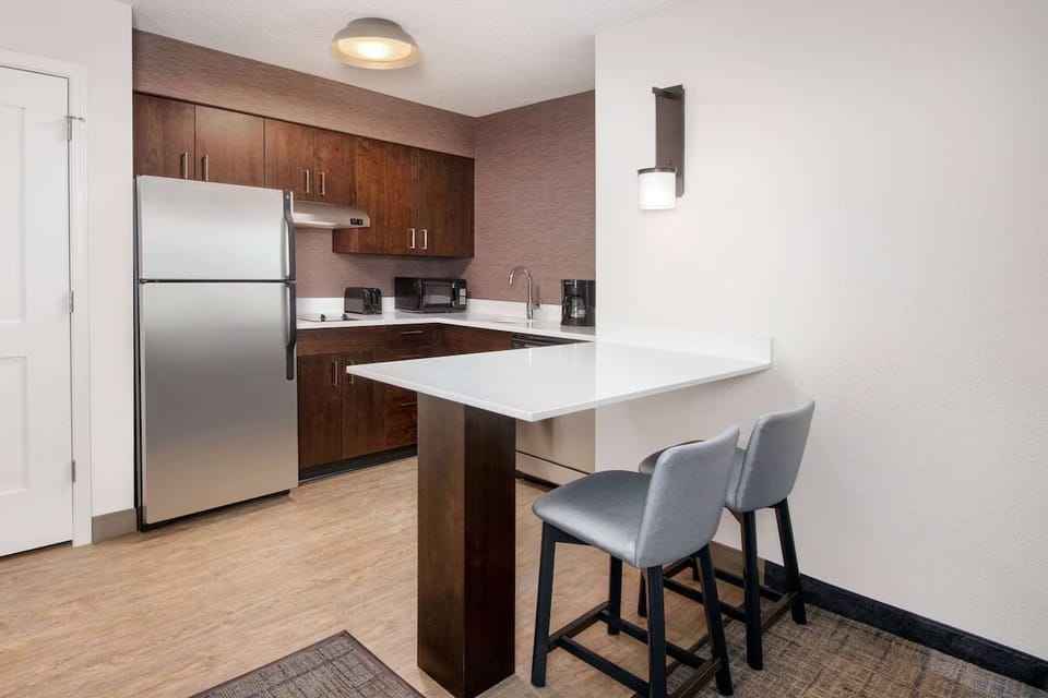 Savor morning coffee at the breakfast bar in style.