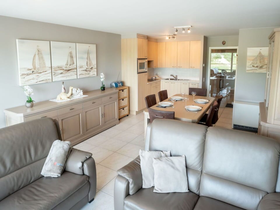 Couch, Furniture, Property, Table, Cabinetry, Picture Frame, Chair, Interior Design, Comfort, Living Room