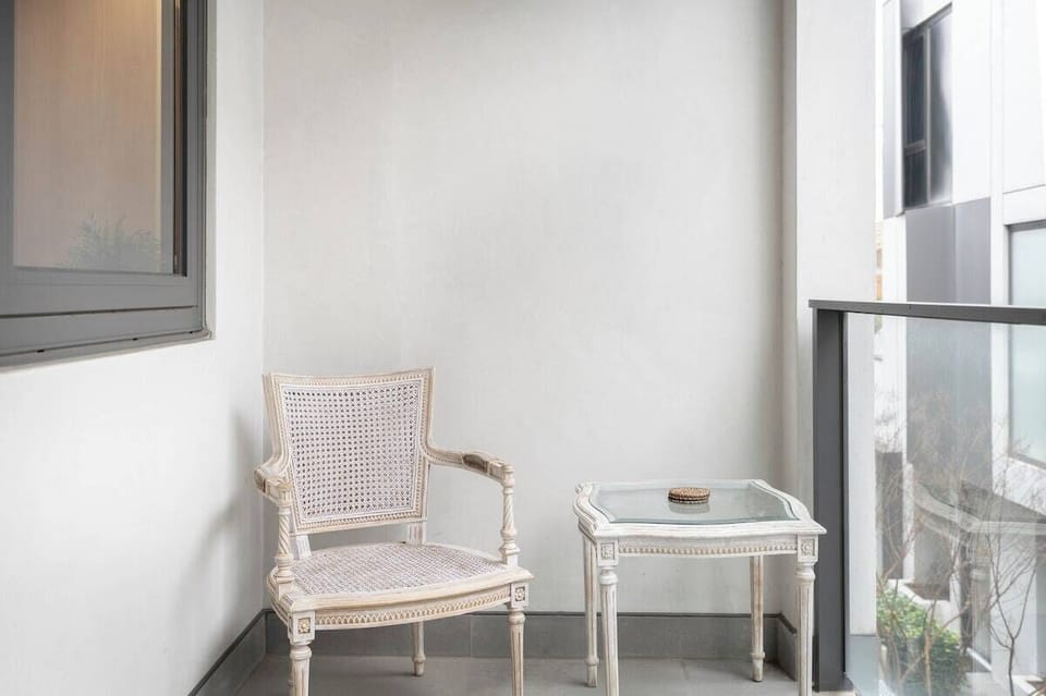 Take in the buzz of the city from this private balcony. Whether sitting down to your morning coffee or evening wine, this space creates the perfect urban retreat.