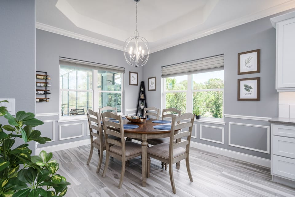 Spend mealtime in the dining space by the lovely windows.