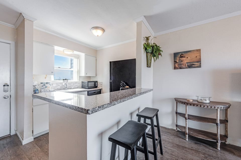 Your modern kitchen awaits with granite countertops, breakfast bar seating, and everything you need to whip up your favorite meals.