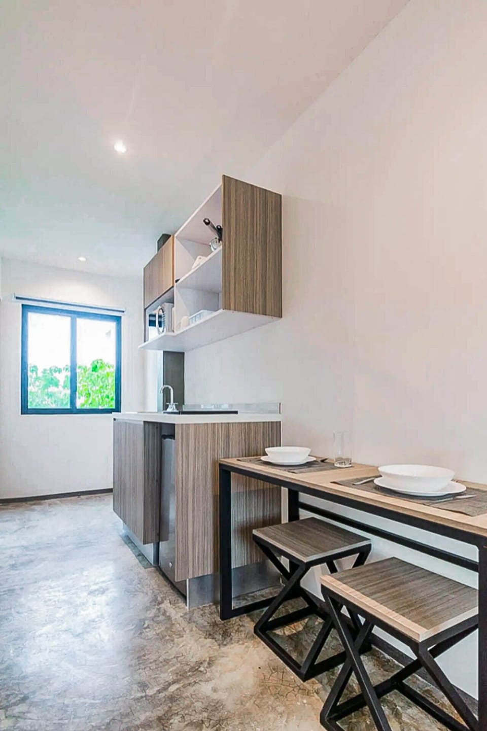 Cozy kitchen with table and chairs in Playa del Carmen rental