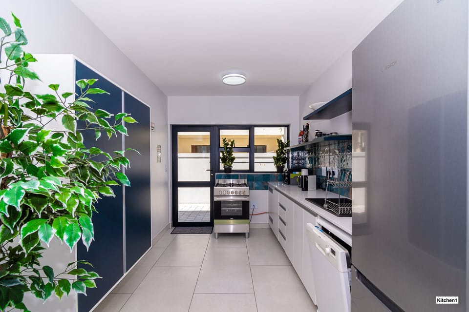 Kitchen with gas stove and amenities