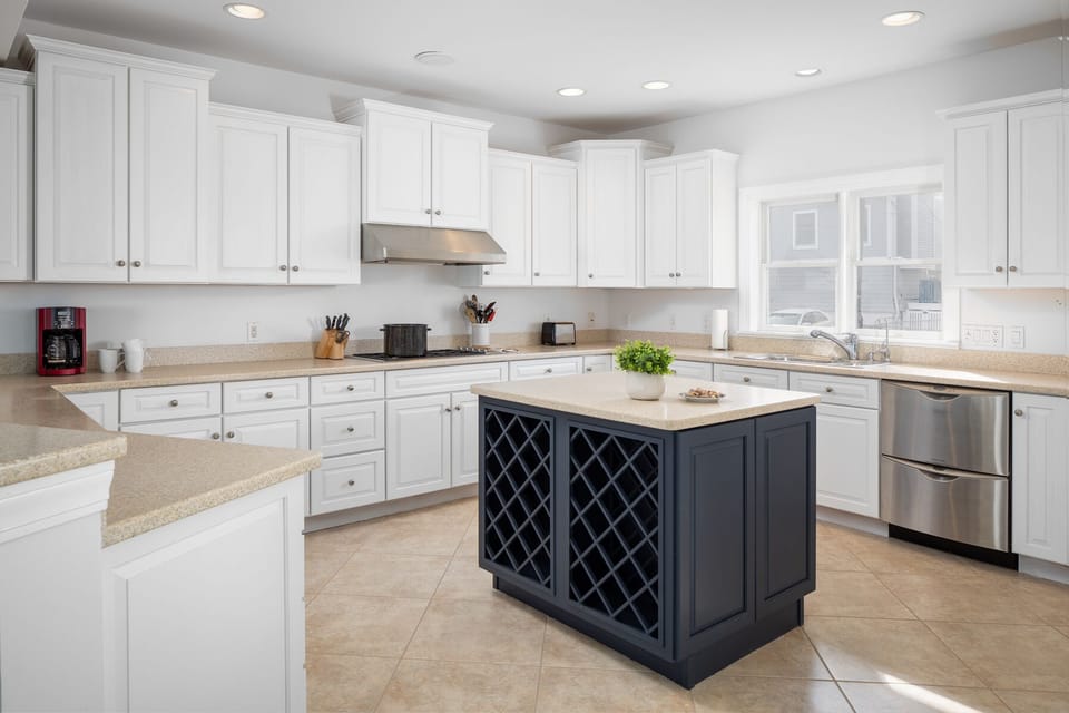 Large kitchen with high end appliances and lots of counter space.