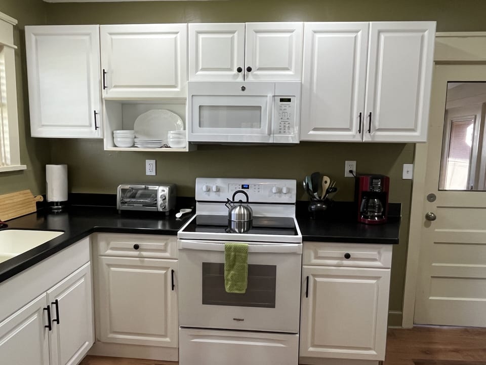 Full Kitchen with all pans, dishes, etc.