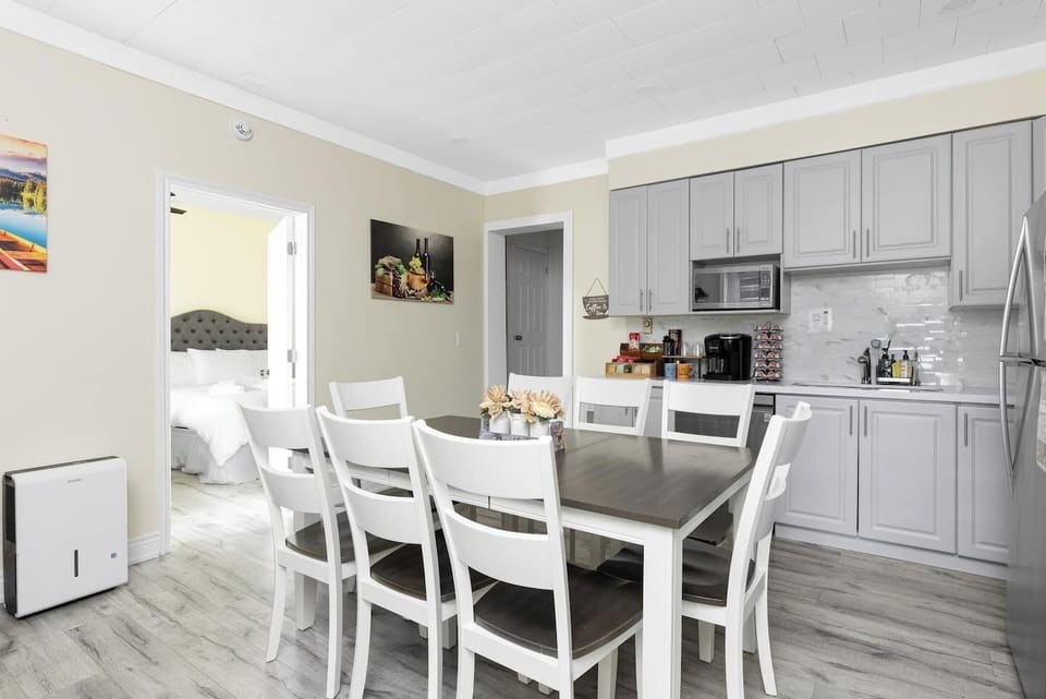 The bedroom on the left includes the 2 queen size beds.