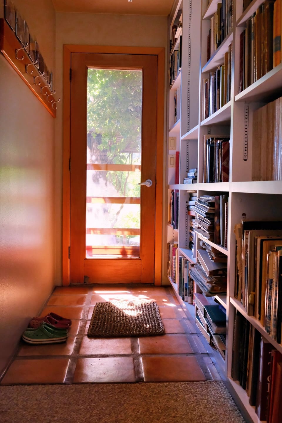 back hallway, large book collection for guests to use while staying on the ranch