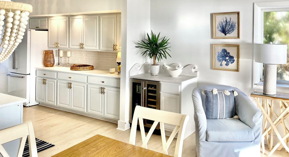 Kitchen w/ beverage refrigerator.