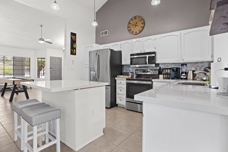 Remodeled kitchen with stainless steel appliances.