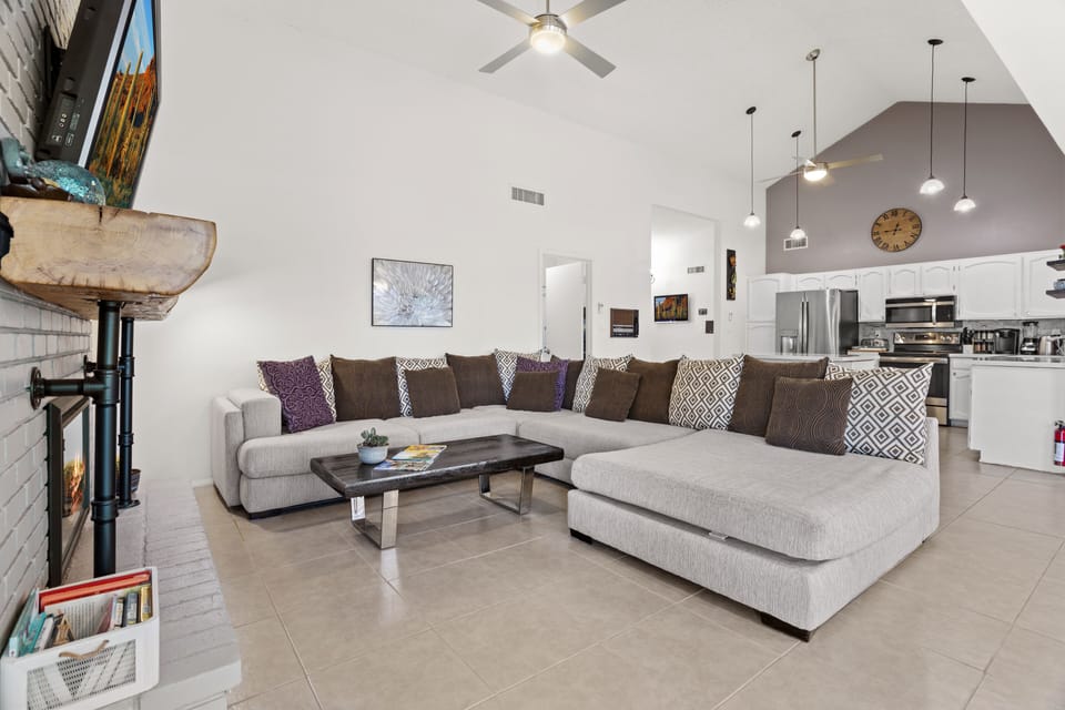 Large family room with an electric fireplace, 65” Sony TV with Netflix & Hulu