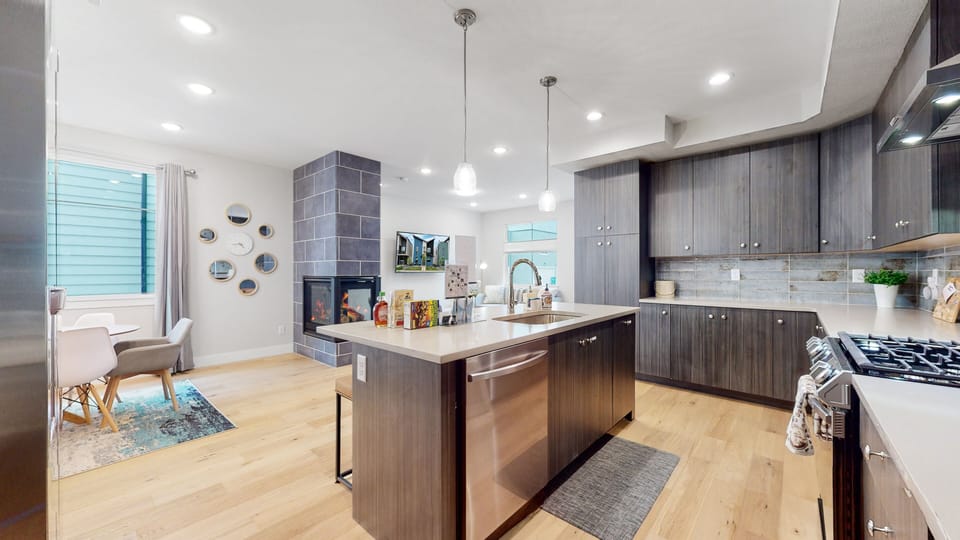 Spacious kitchen with a family-welcoming island size.