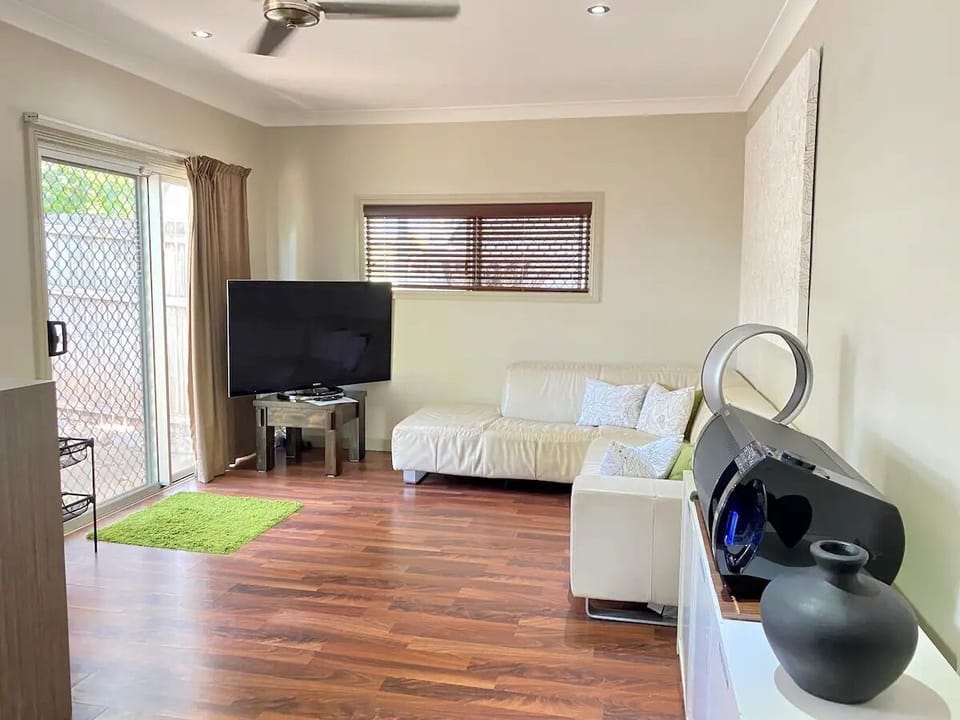 Living/Dining area. Smart TV with access to Netflix and Bluetooth Stereo System.