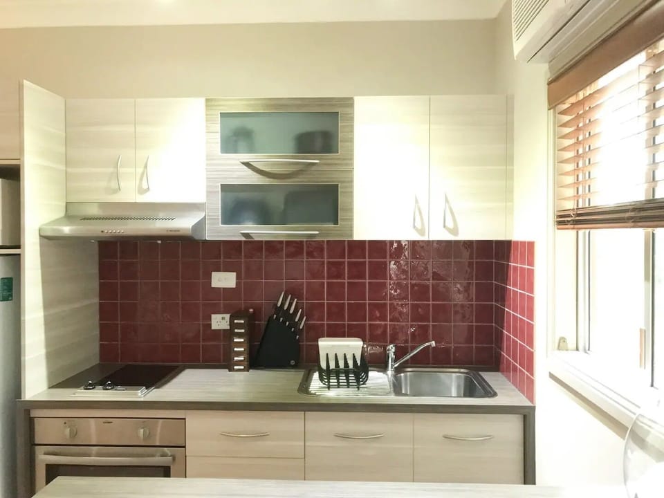 Fully equipped kitchen with all the cooking facilities, fridge and microwave.