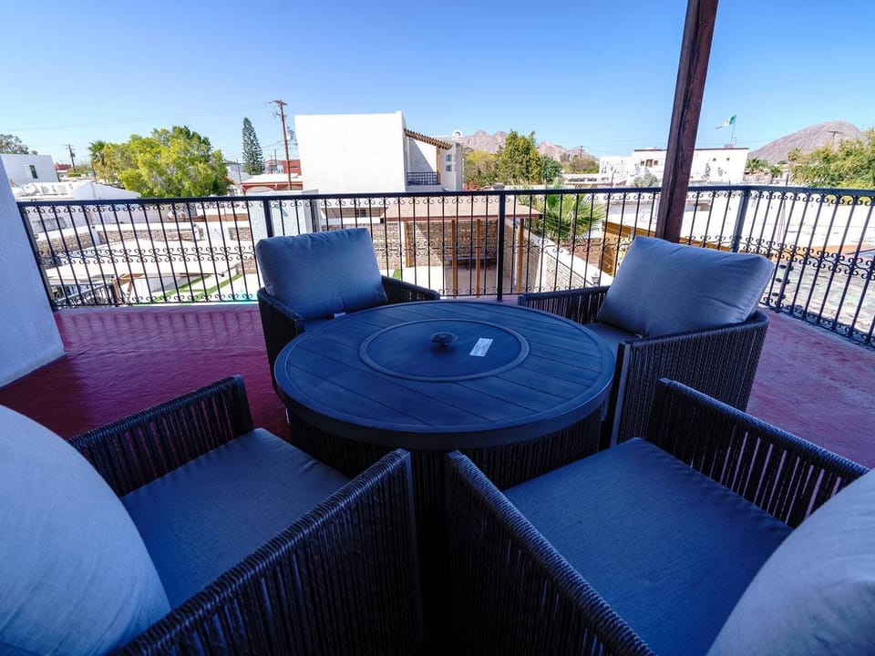 Unwind above it all. This terrace relaxing area at Casa Barquito vacation rental in San Felipe BC Mexico offers comfortable seating, fresh air, and a perfect spot for sunset drinks.
