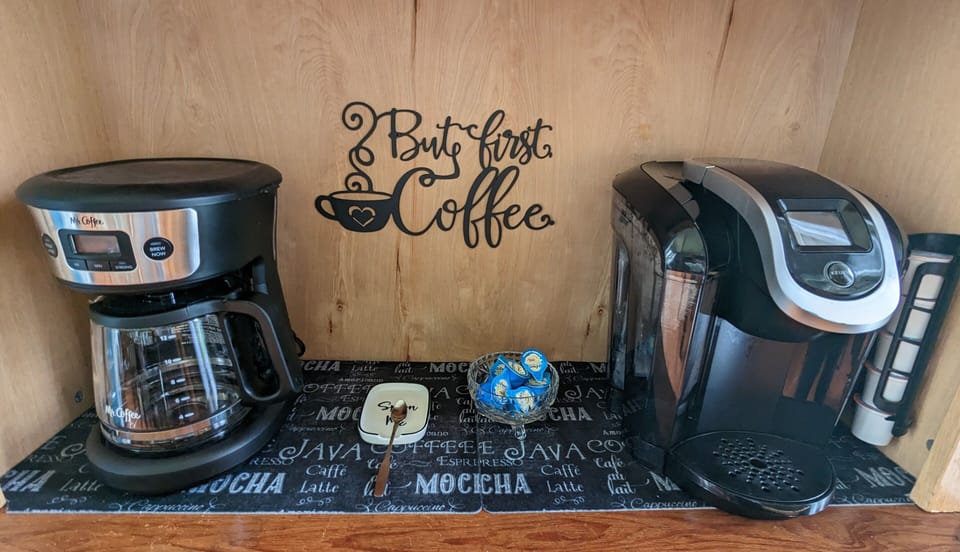 Coffee station with Keurig and 12 cup brewer.