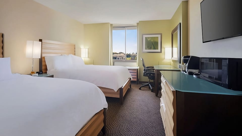 Settle in with a dedicated desk and easy in-room entertainment.