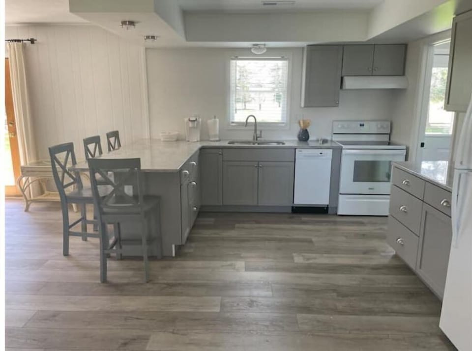 Our open space kitchen is completely stocked with everything you need.  

