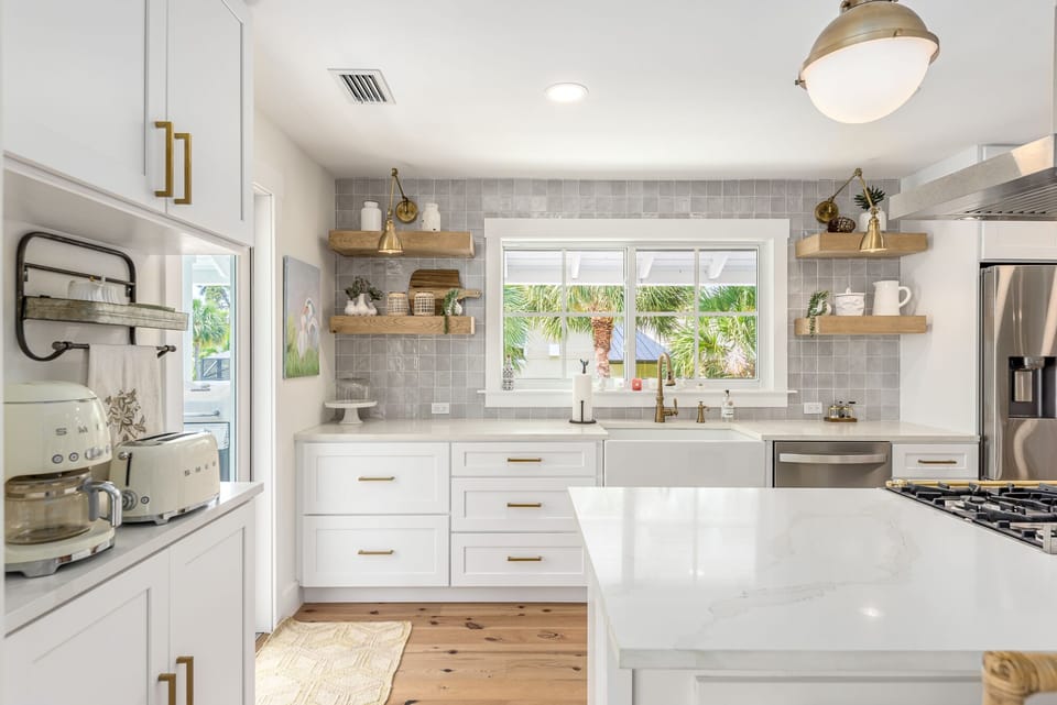 Gleaming all new kitchen with quartz counters, shaker cabinets & drawers
