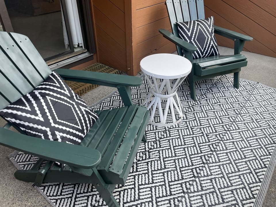 Sip wine on the patio while relaxing among the pines and manicured grounds